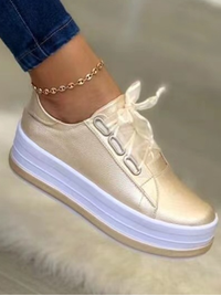 <tc>Tenis Helana dourado e branco</tc>